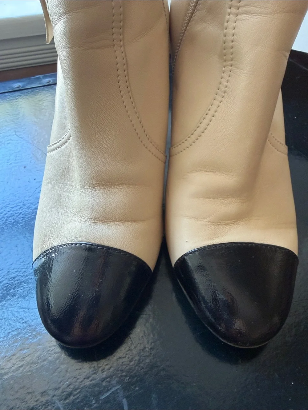 CHANEL Beige and Black Bow Accent Leather Ankle Boots